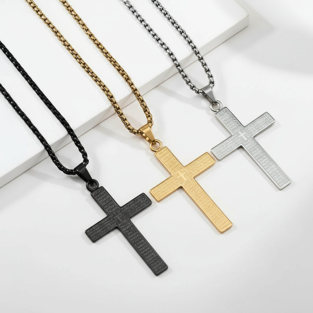 Four cross-shaped pendants on chains with 'YWZO' branding on a dark background